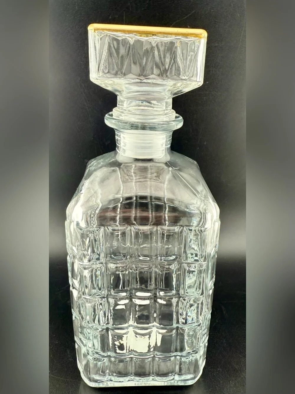 Glass Decanter 9”H. Cut glass with sealed lid and gold edges. New